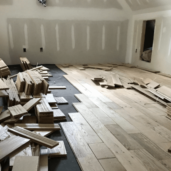 Wide-plank white oak hardwood floor with natural matte finish in a renovated Cary, NC home by Corner Solutions.