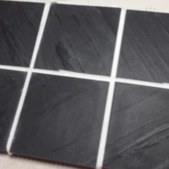 Layered stone textures and detailed mosaic flooring create a polished, custom shower space. (1)