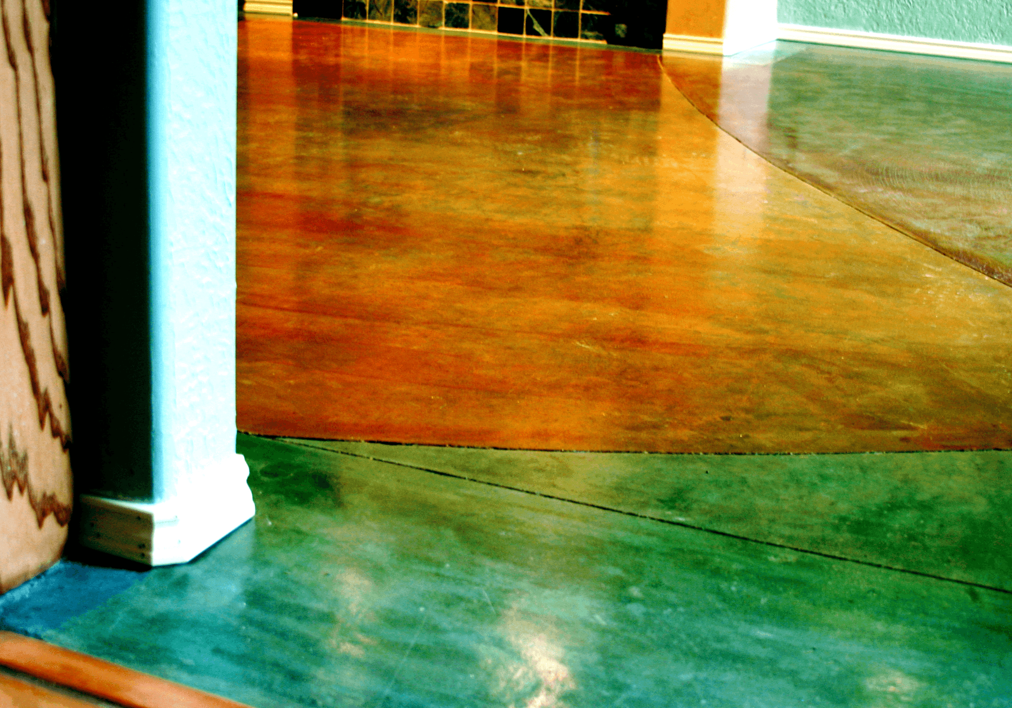 Custom stained concrete flooring installation with polished decorative finish