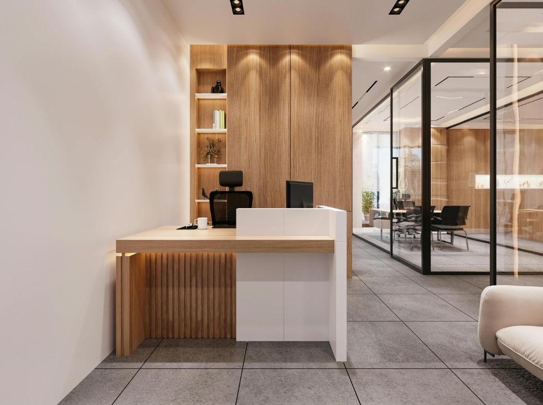 Modern Cary retail and commercial renovation interior with tile flooring, wood accent walls, reception desk, glass partitions, and updated lighting.